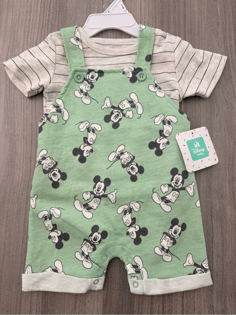 Disney Baby Neutral Bodysuit with Green Logo